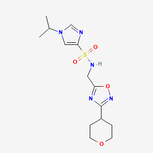 molecular formula C14H21N5O4S B2566392 N-{[3-(oxan-4-yl)-1,2,4-oxadiazol-5-yl]methyl}-1-(propan-2-yl)-1H-imidazole-4-sulfonamide CAS No. 2034332-27-7
