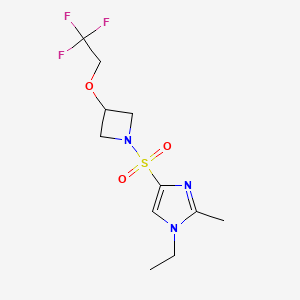 molecular formula C11H16F3N3O3S B2567569 1-ethyl-2-methyl-4-{[3-(2,2,2-trifluoroethoxy)azetidin-1-yl]sulfonyl}-1H-imidazole CAS No. 2320377-45-3