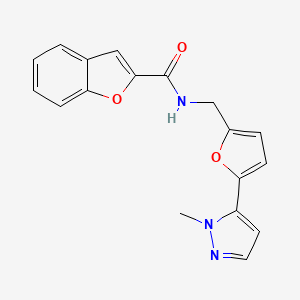 molecular formula C18H15N3O3 B2568625 N-{[5-(1-methyl-1H-pyrazol-5-yl)furan-2-yl]methyl}-1-benzofuran-2-carboxamide CAS No. 2415571-04-7