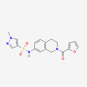 molecular formula C18H18N4O4S B2570871 N-(2-(furan-2-carbonyl)-1,2,3,4-tetrahydroisoquinolin-7-yl)-1-methyl-1H-pyrazole-4-sulfonamide CAS No. 1448036-88-1