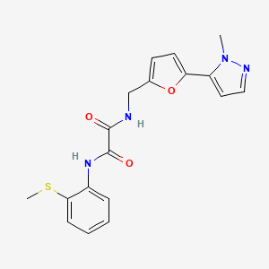 molecular formula C18H18N4O3S B2572521 N-{[5-(1-methyl-1H-pyrazol-5-yl)furan-2-yl]methyl}-N'-[2-(methylsulfanyl)phenyl]ethanediamide CAS No. 2415489-17-5