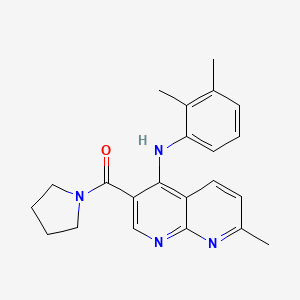 molecular formula C22H24N4O B2574053 N-(2,3-DIMETHYLPHENYL)-7-METHYL-3-(PYRROLIDINE-1-CARBONYL)-1,8-NAPHTHYRIDIN-4-AMINE CAS No. 1251693-17-0