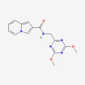 molecular formula C15H15N5O3 B2574093 N-[(4,6-dimethoxy-1,3,5-triazin-2-yl)methyl]indolizine-2-carboxamide CAS No. 2034425-31-3