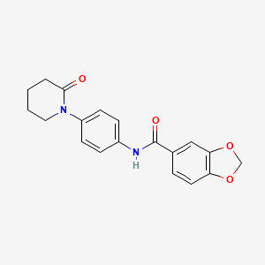 molecular formula C19H18N2O4 B2575424 N-[4-(2-oxopiperidin-1-yl)phenyl]-2H-1,3-benzodioxole-5-carboxamide CAS No. 941918-52-1