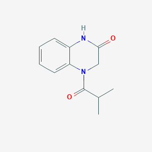 B2579013 4-isobutyryl-3,4-dihydroquinoxalin-2(1H)-one CAS No. 893777-78-1