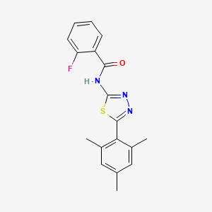 molecular formula C18H16FN3OS B2579492 2-fluoro-N-[5-(2,4,6-trimethylphenyl)-1,3,4-thiadiazol-2-yl]benzamide CAS No. 391227-13-7