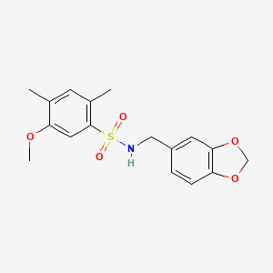 molecular formula C17H19NO5S B2580627 N-[(2H-1,3-benzodioxol-5-yl)methyl]-5-methoxy-2,4-dimethylbenzene-1-sulfonamide CAS No. 433972-60-2