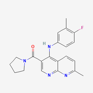 molecular formula C21H21FN4O B2582283 N-(4-fluoro-3-methylphenyl)-7-methyl-3-(pyrrolidine-1-carbonyl)-1,8-naphthyridin-4-amine CAS No. 1251599-11-7