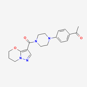 molecular formula C19H22N4O3 B2582956 1-(4-(4-(6,7-dihydro-5H-pyrazolo[5,1-b][1,3]oxazine-3-carbonyl)piperazin-1-yl)phenyl)ethanone CAS No. 1428374-58-6
