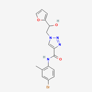 molecular formula C16H15BrN4O3 B2584829 N-(4-bromo-2-methylphenyl)-1-(2-(furan-2-yl)-2-hydroxyethyl)-1H-1,2,3-triazole-4-carboxamide CAS No. 2034478-27-6