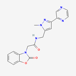 molecular formula C18H16N6O3 B2585342 N-((1-methyl-3-(pyrazin-2-yl)-1H-pyrazol-5-yl)methyl)-2-(2-oxobenzo[d]oxazol-3(2H)-yl)acetamide CAS No. 2034457-15-1