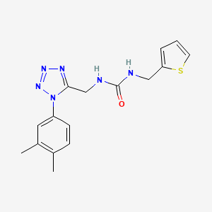 molecular formula C16H18N6OS B2586514 1-((1-(3,4-dimethylphenyl)-1H-tetrazol-5-yl)methyl)-3-(thiophen-2-ylmethyl)urea CAS No. 941964-60-9