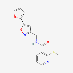 molecular formula C15H13N3O3S B2586709 N-((5-(furan-2-yl)isoxazol-3-yl)methyl)-2-(methylthio)nicotinamide CAS No. 1207010-46-5