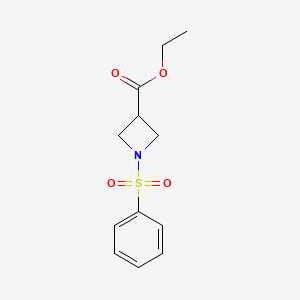molecular formula C12H15NO4S B2589426 Ethyl 1-(benzenesulfonyl)azetidine-3-carboxylate CAS No. 866152-75-2
