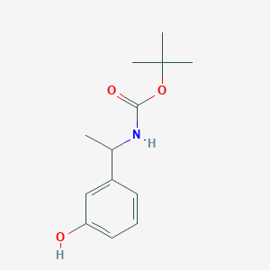 molecular formula C13H19NO3 B2590273 tert-butyl N-[1-(3-hydroxyphenyl)ethyl]carbamate CAS No. 1246210-72-9
