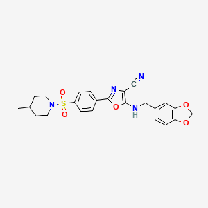 B2590366 5-[(1,3-Benzodioxol-5-ylmethyl)amino]-2-{4-[(4-methylpiperidin-1-yl)sulfonyl]phenyl}-1,3-oxazole-4-carbonitrile CAS No. 941000-62-0