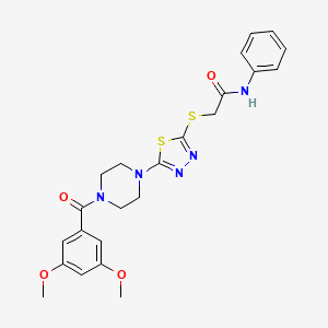 molecular formula C23H25N5O4S2 B2590490 2-((5-(4-(3,5-dimethoxybenzoyl)piperazin-1-yl)-1,3,4-thiadiazol-2-yl)thio)-N-phenylacetamide CAS No. 1172888-60-6