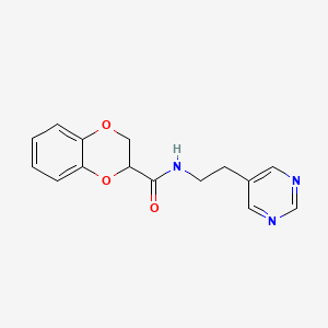 N-(2-(pyrimidin-5-yl)ethyl)-2,3-dihydrobenzo[b][1,4]dioxine-2-carboxamide
