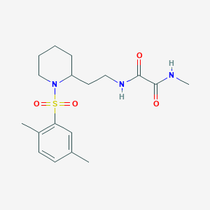 molecular formula C18H27N3O4S B2592570 N'-{2-[1-(2,5-dimethylbenzenesulfonyl)piperidin-2-yl]ethyl}-N-methylethanediamide CAS No. 898426-67-0