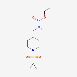 molecular formula C12H22N2O4S B2595552 Ethyl ((1-(cyclopropylsulfonyl)piperidin-4-yl)methyl)carbamate CAS No. 1235064-63-7