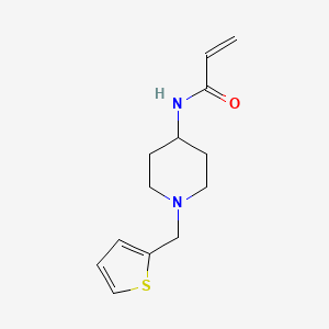 molecular formula C13H18N2OS B2596402 N-[1-(Thiophen-2-ylmethyl)piperidin-4-yl]prop-2-enamide CAS No. 2189044-90-2