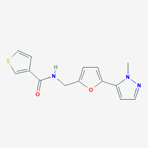 molecular formula C14H13N3O2S B2597027 N-{[5-(1-methyl-1H-pyrazol-5-yl)furan-2-yl]methyl}thiophene-3-carboxamide CAS No. 2415455-83-1