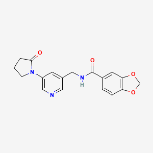 molecular formula C18H17N3O4 B2597231 N-((5-(2-oxopyrrolidin-1-yl)pyridin-3-yl)methyl)benzo[d][1,3]dioxole-5-carboxamide CAS No. 2034387-63-6