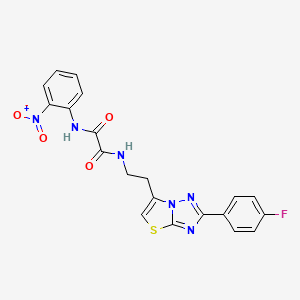 molecular formula C20H15FN6O4S B2599155 N-{2-[2-(4-fluorophenyl)-[1,2,4]triazolo[3,2-b][1,3]thiazol-6-yl]ethyl}-N'-(2-nitrophenyl)ethanediamide CAS No. 897757-97-0