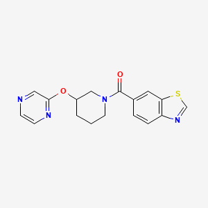 molecular formula C17H16N4O2S B2599863 6-[3-(pyrazin-2-yloxy)piperidine-1-carbonyl]-1,3-benzothiazole CAS No. 2034578-73-7