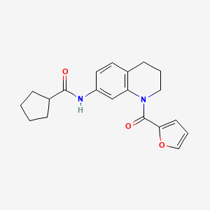 molecular formula C20H22N2O3 B2600543 N-[1-(furan-2-carbonyl)-1,2,3,4-tetrahydroquinolin-7-yl]cyclopentanecarboxamide CAS No. 1005300-89-9