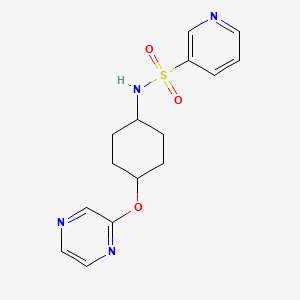 molecular formula C15H18N4O3S B2601209 N-((1r,4r)-4-(pyrazin-2-yloxy)cyclohexyl)pyridine-3-sulfonamide CAS No. 2034580-21-5