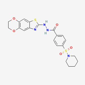 B2605334 N'-(6,7-dihydro-[1,4]dioxino[2',3':4,5]benzo[1,2-d]thiazol-2-yl)-4-(piperidin-1-ylsulfonyl)benzohydrazide CAS No. 851988-65-3
