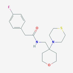 2-(4-Fluorophenyl)-N-[(4-thiomorpholin-4-yloxan-4-yl)methyl]acetamide
