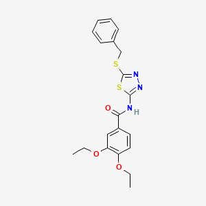 molecular formula C20H21N3O3S2 B2609543 N-[5-(benzylsulfanyl)-1,3,4-thiadiazol-2-yl]-3,4-diethoxybenzamide CAS No. 477215-66-0