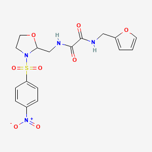 N1-(furan-2-ylmethyl)-N2-((3-((4-nitrophenyl)sulfonyl)oxazolidin-2-yl)methyl)oxalamide