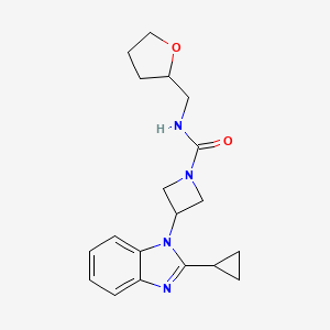 3-(2-Cyclopropylbenzimidazol-1-yl)-N-(oxolan-2-ylmethyl)azetidine-1-carboxamide