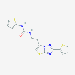 molecular formula C15H13N5OS3 B2614411 1-(Thiophen-2-yl)-3-(2-(2-(thiophen-2-yl)thiazolo[3,2-b][1,2,4]triazol-6-yl)ethyl)urea CAS No. 1209677-54-2