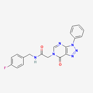 molecular formula C19H15FN6O2 B2615929 N-[(4-fluorophenyl)methyl]-2-{7-oxo-3-phenyl-3H,6H,7H-[1,2,3]triazolo[4,5-d]pyrimidin-6-yl}acetamide CAS No. 892478-51-2