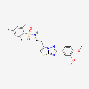 molecular formula C23H26N4O4S2 B2616237 N-{2-[2-(3,4-dimethoxyphenyl)-[1,2,4]triazolo[3,2-b][1,3]thiazol-6-yl]ethyl}-2,4,6-trimethylbenzene-1-sulfonamide CAS No. 895440-43-4