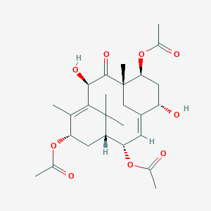molecular formula C26H36O9 B026187 Taxuspine W CAS No. 181309-92-2