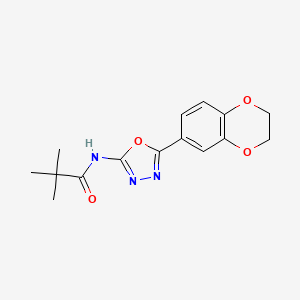 molecular formula C15H17N3O4 B2625177 N-[5-(2,3-dihydro-1,4-benzodioxin-6-yl)-1,3,4-oxadiazol-2-yl]-2,2-dimethylpropanamide CAS No. 851094-64-9