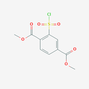 molecular formula C10H9ClO6S B2626196 1,4-Dimethyl 2-(chlorosulfonyl)benzene-1,4-dicarboxylate CAS No. 80998-70-5