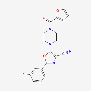 molecular formula C20H18N4O3 B2626921 5-(4-(Furan-2-carbonyl)piperazin-1-yl)-2-(m-tolyl)oxazole-4-carbonitrile CAS No. 946308-45-8
