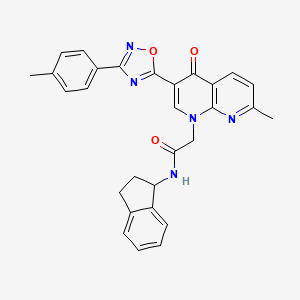 molecular formula C29H25N5O3 B2627530 N-(2,3-dihydro-1H-inden-1-yl)-2-{7-methyl-3-[3-(4-methylphenyl)-1,2,4-oxadiazol-5-yl]-4-oxo-1,4-dihydro-1,8-naphthyridin-1-yl}acetamide CAS No. 1029784-23-3