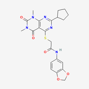molecular formula C22H23N5O5S B2627590 N-(benzo[d][1,3]dioxol-5-yl)-2-((2-cyclopentyl-6,8-dimethyl-5,7-dioxo-5,6,7,8-tetrahydropyrimido[4,5-d]pyrimidin-4-yl)thio)acetamide CAS No. 872619-42-6
