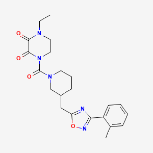 molecular formula C22H27N5O4 B2628308 1-Ethyl-4-(3-((3-(o-tolyl)-1,2,4-oxadiazol-5-yl)methyl)piperidine-1-carbonyl)piperazine-2,3-dione CAS No. 1705104-08-0