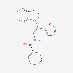 N-(2-(furan-2-yl)-2-(indolin-1-yl)ethyl)cyclohexanecarboxamide