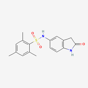 molecular formula C17H18N2O3S B2629827 2,4,6-三甲基-N-(2-氧代吲哚-5-基)苯甲磺酰胺 CAS No. 921812-04-6