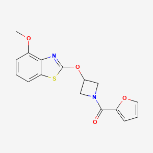 molecular formula C16H14N2O4S B2631061 Furan-2-yl(3-((4-methoxybenzo[d]thiazol-2-yl)oxy)azetidin-1-yl)methanone CAS No. 1421510-24-8