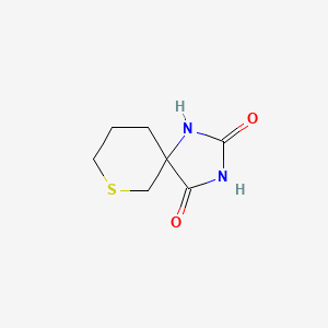molecular formula C7H10N2O2S B2632666 7-Thia-1,3-diazaspiro[4.5]decane-2,4-dione CAS No. 1341859-10-6